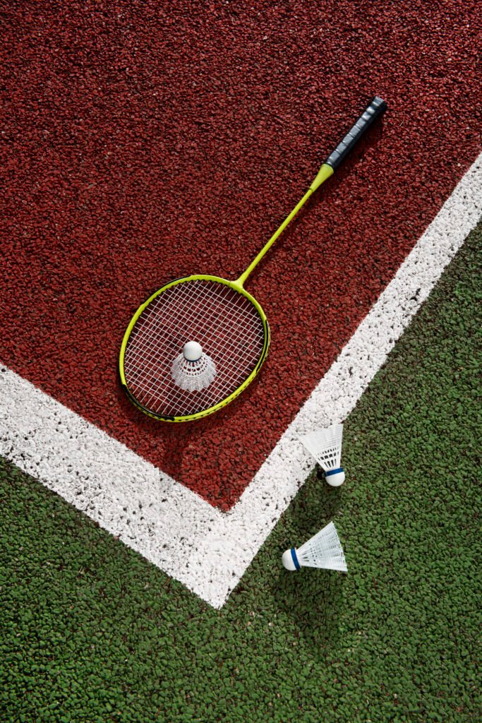 badminton concept with racket shuttlecock
